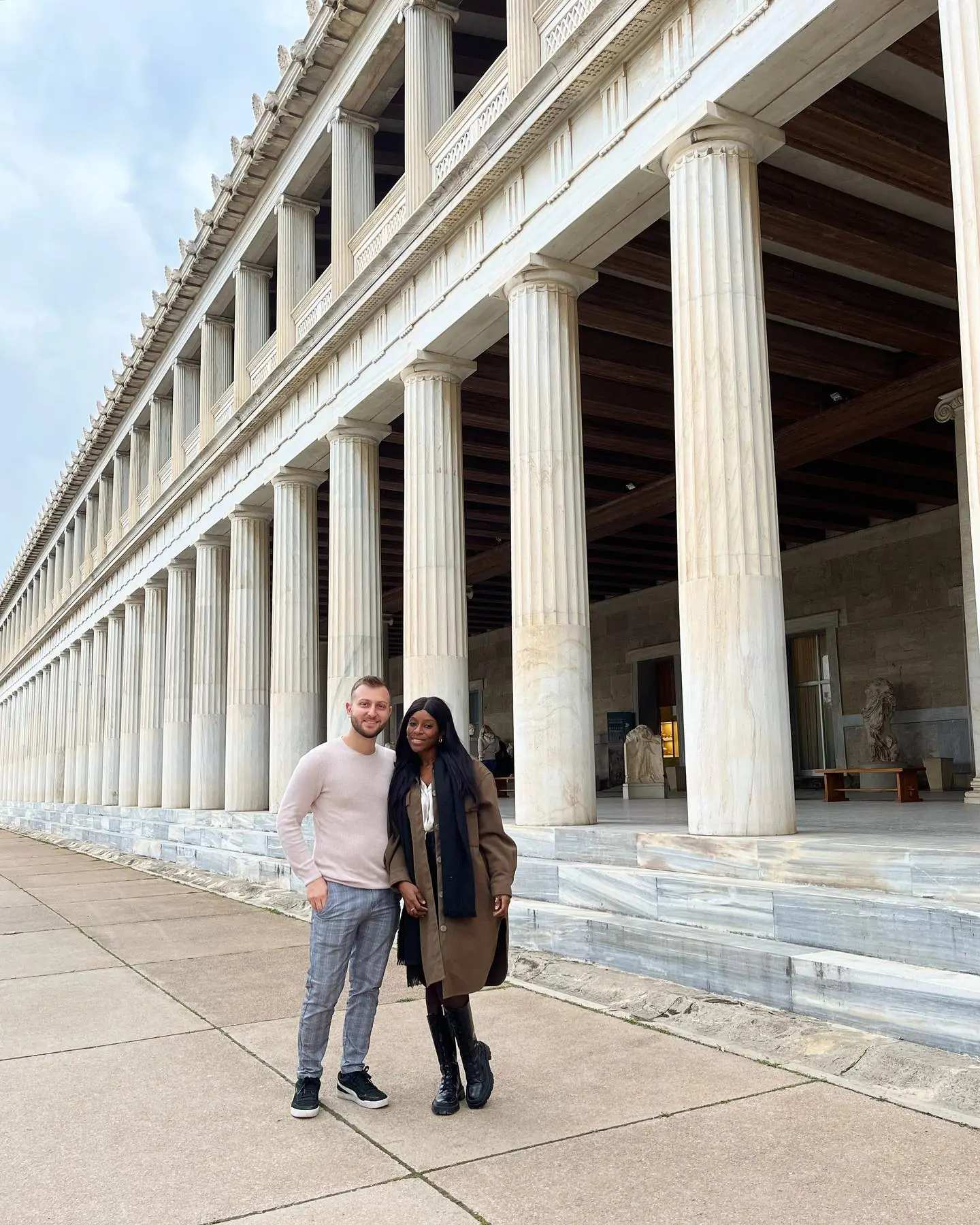 Us outside the long marble facade of the Stoa of Attalos