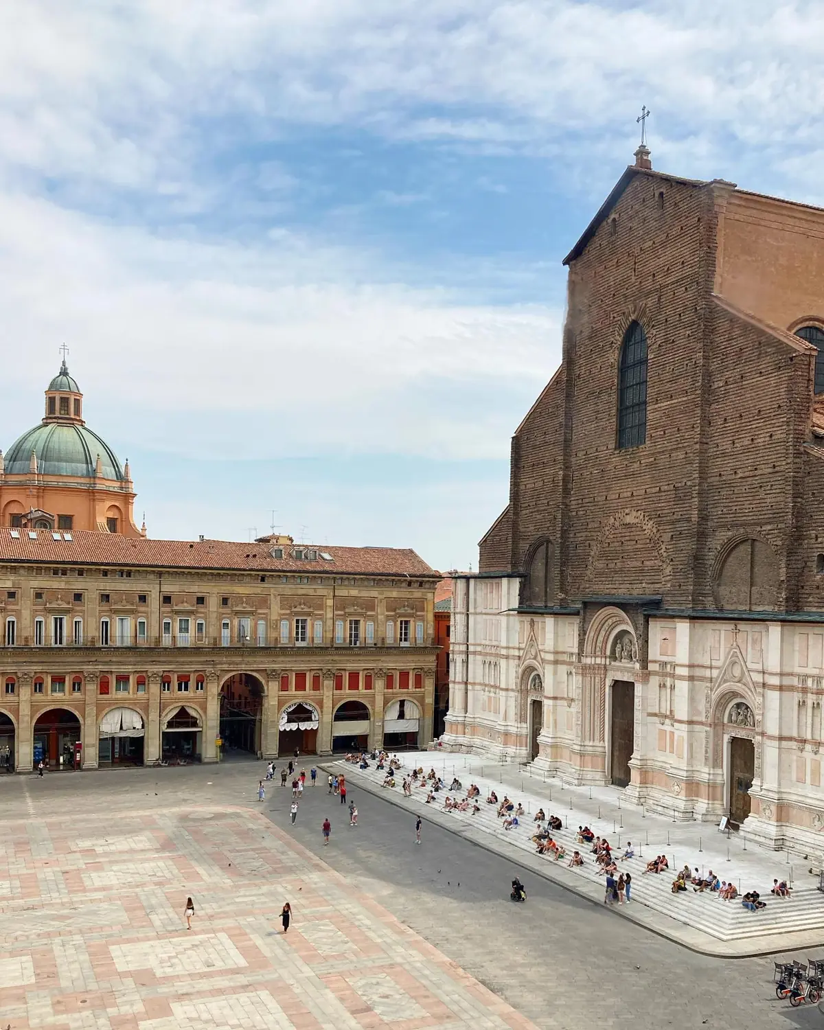 Piazza Maggiore in Bologna with the huge brick facade of San Petronio