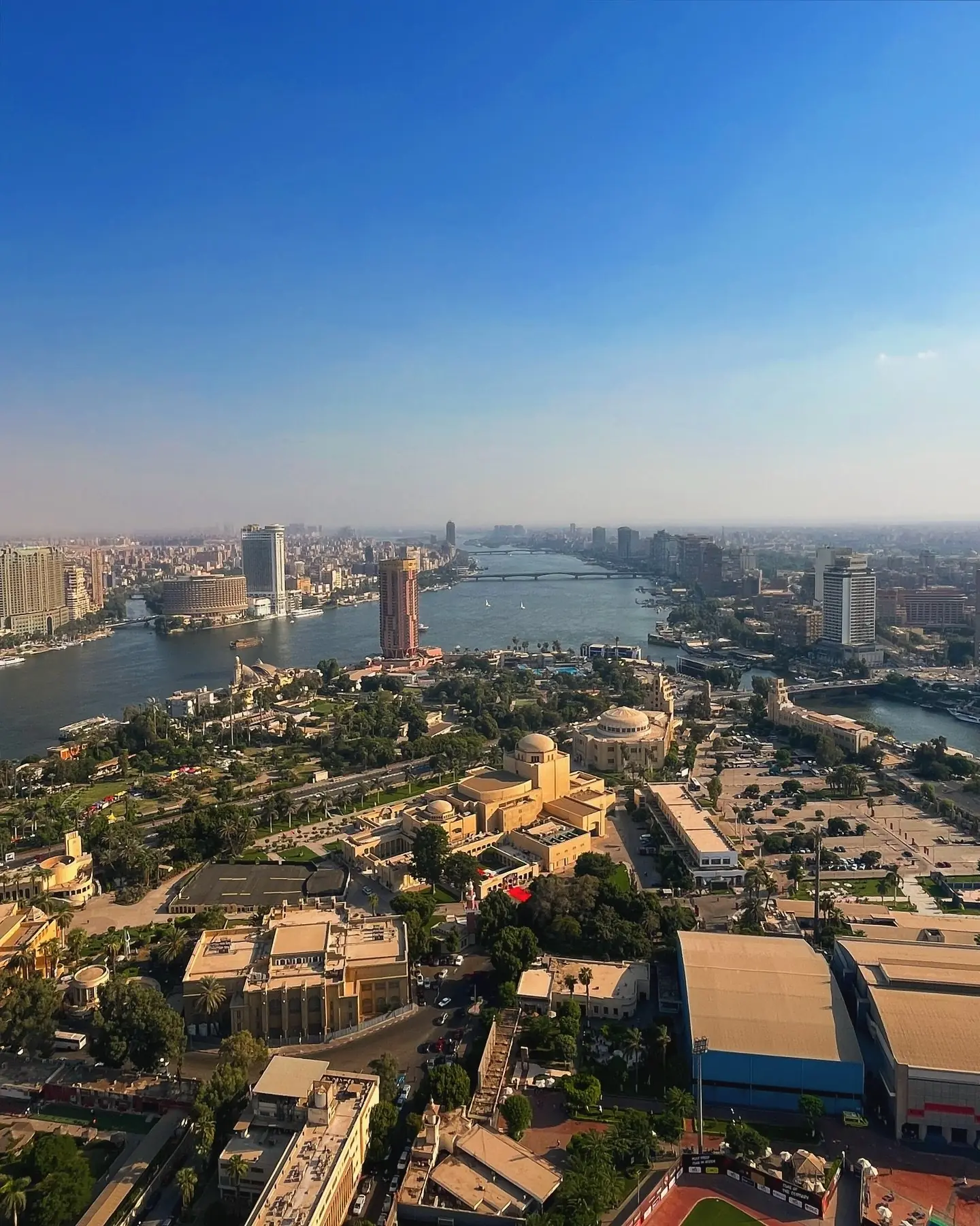 Aerial view of the Nile winding through Cairo with Gezira island below