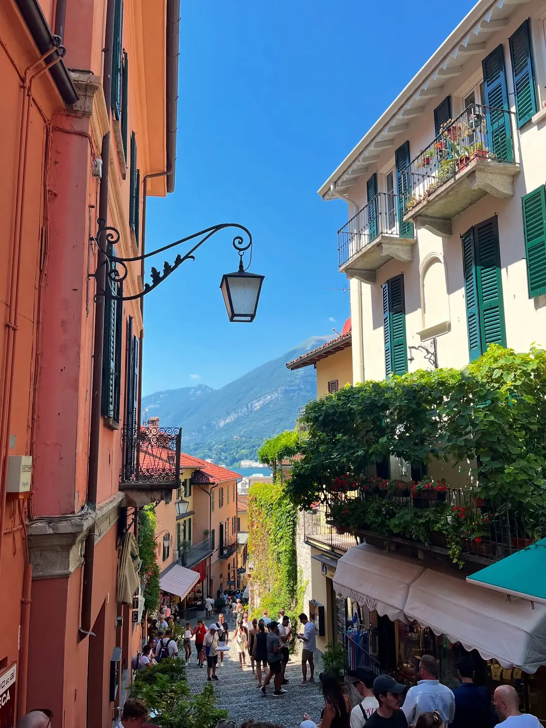 The famous stepped shopping lane in Bellagio with a hanging lantern