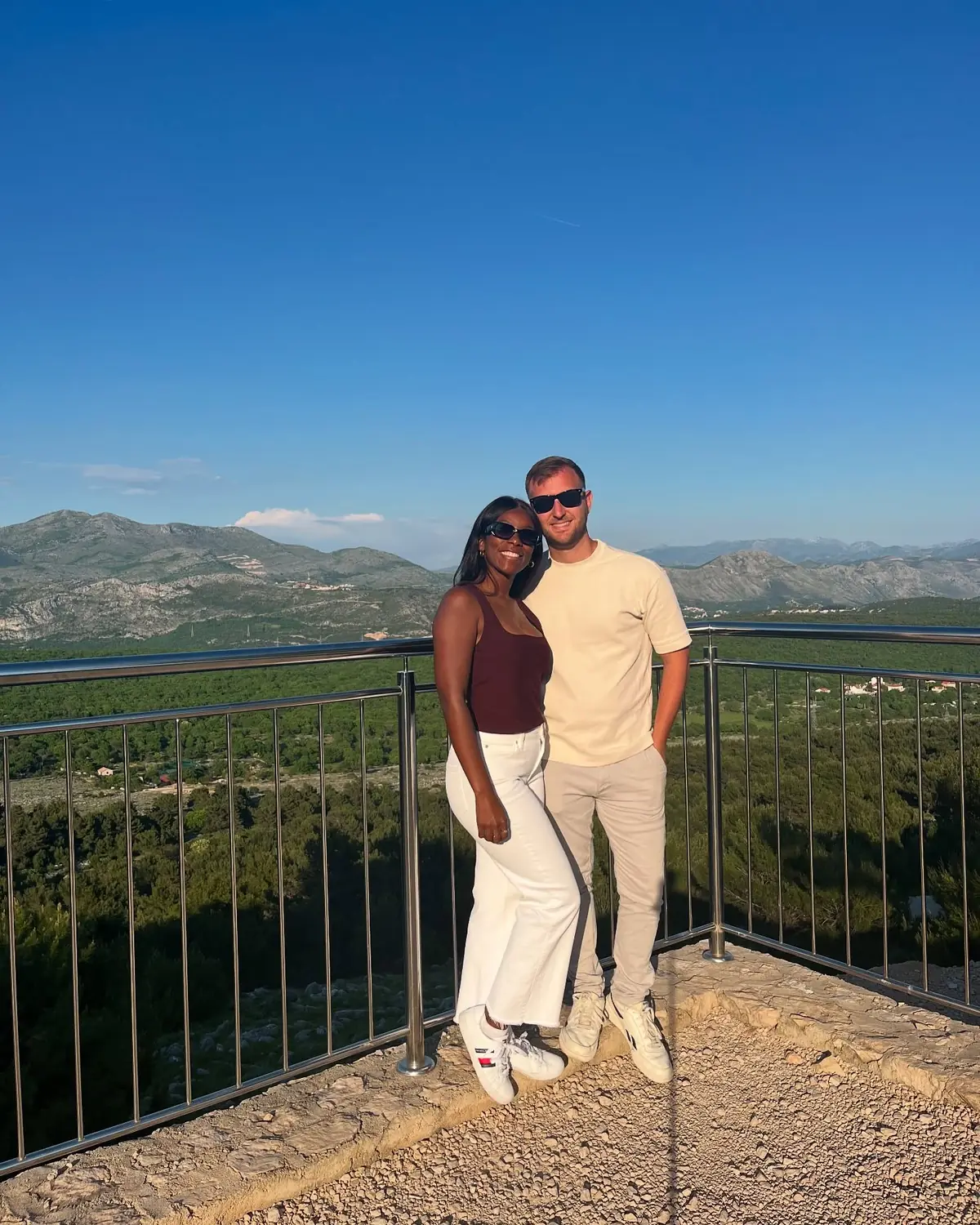 Us at a railed mountain viewpoint above Dubrovnik