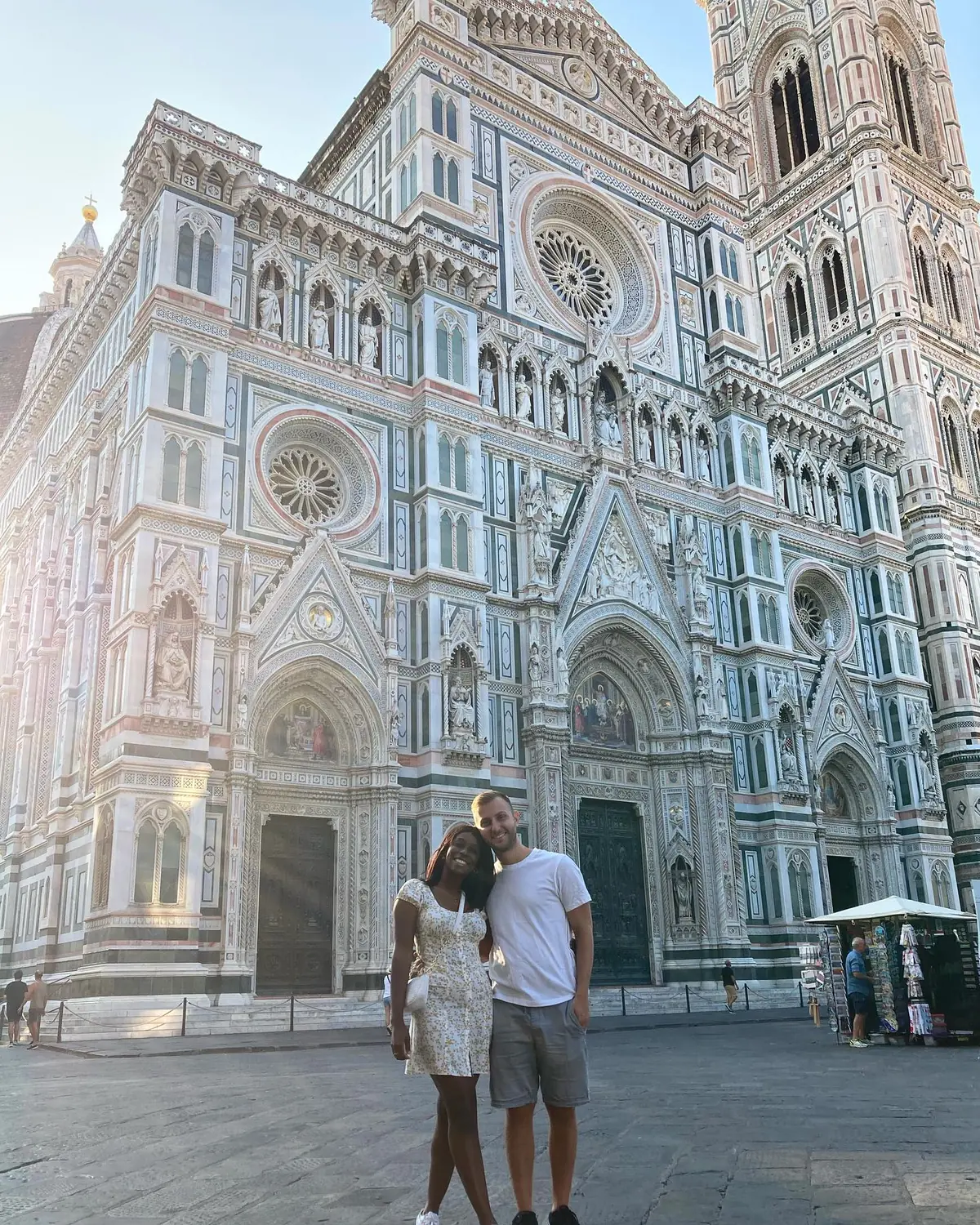 Us in front of the marble facade of Florence Cathedral