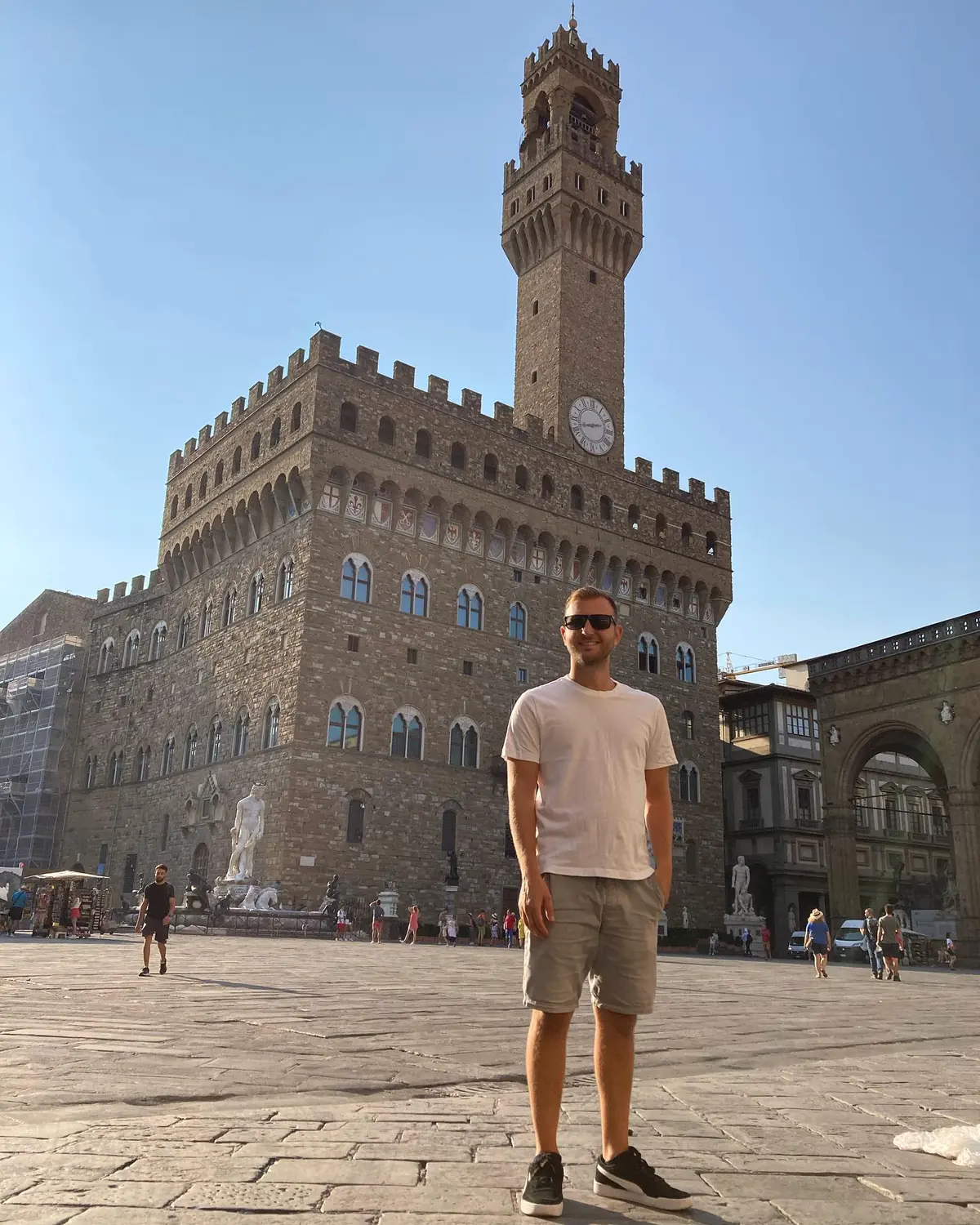 Andrew in Piazza della Signoria in front of the tower of Palazzo Vecchio
