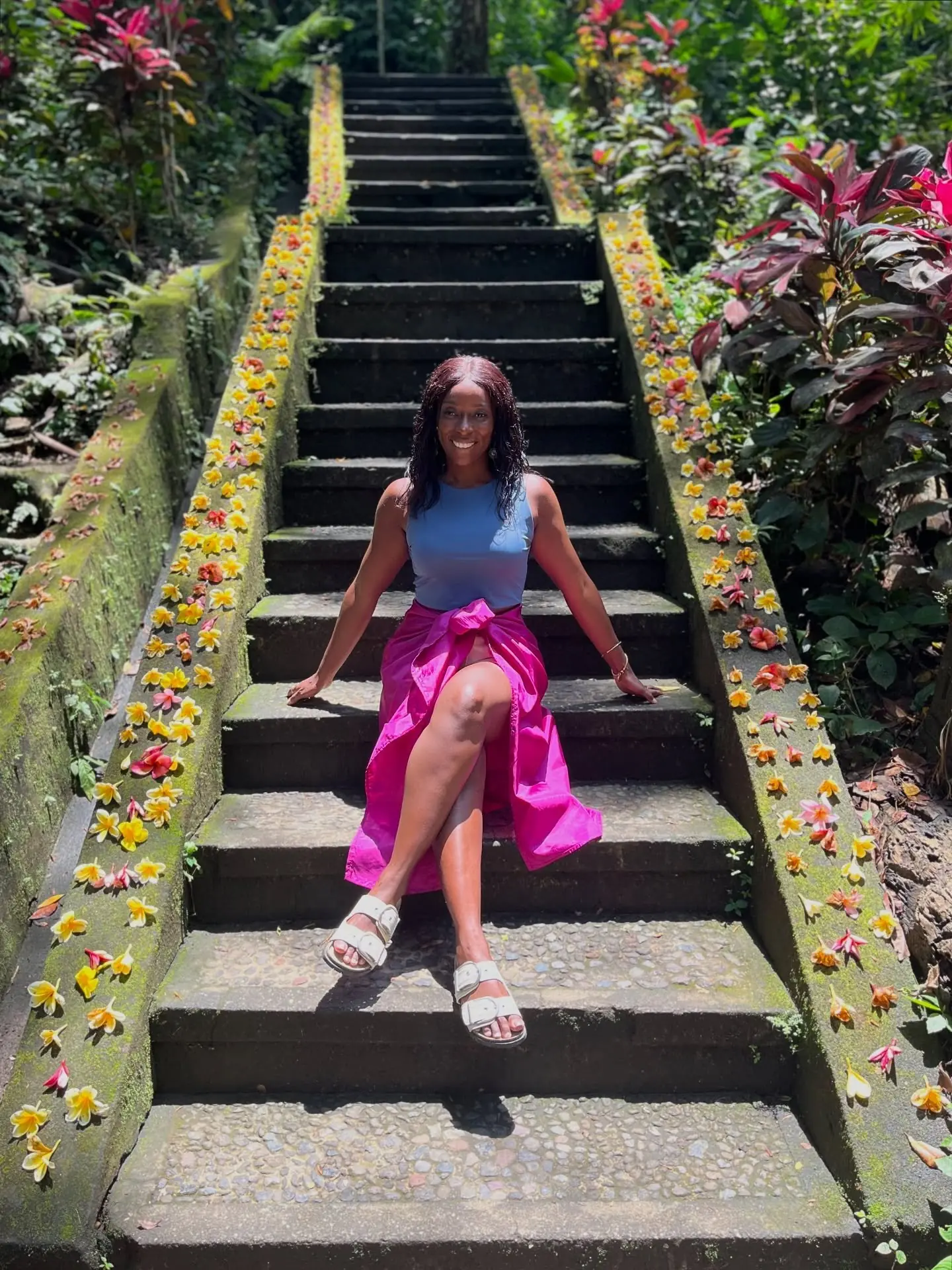 Flower-lined mossy staircase