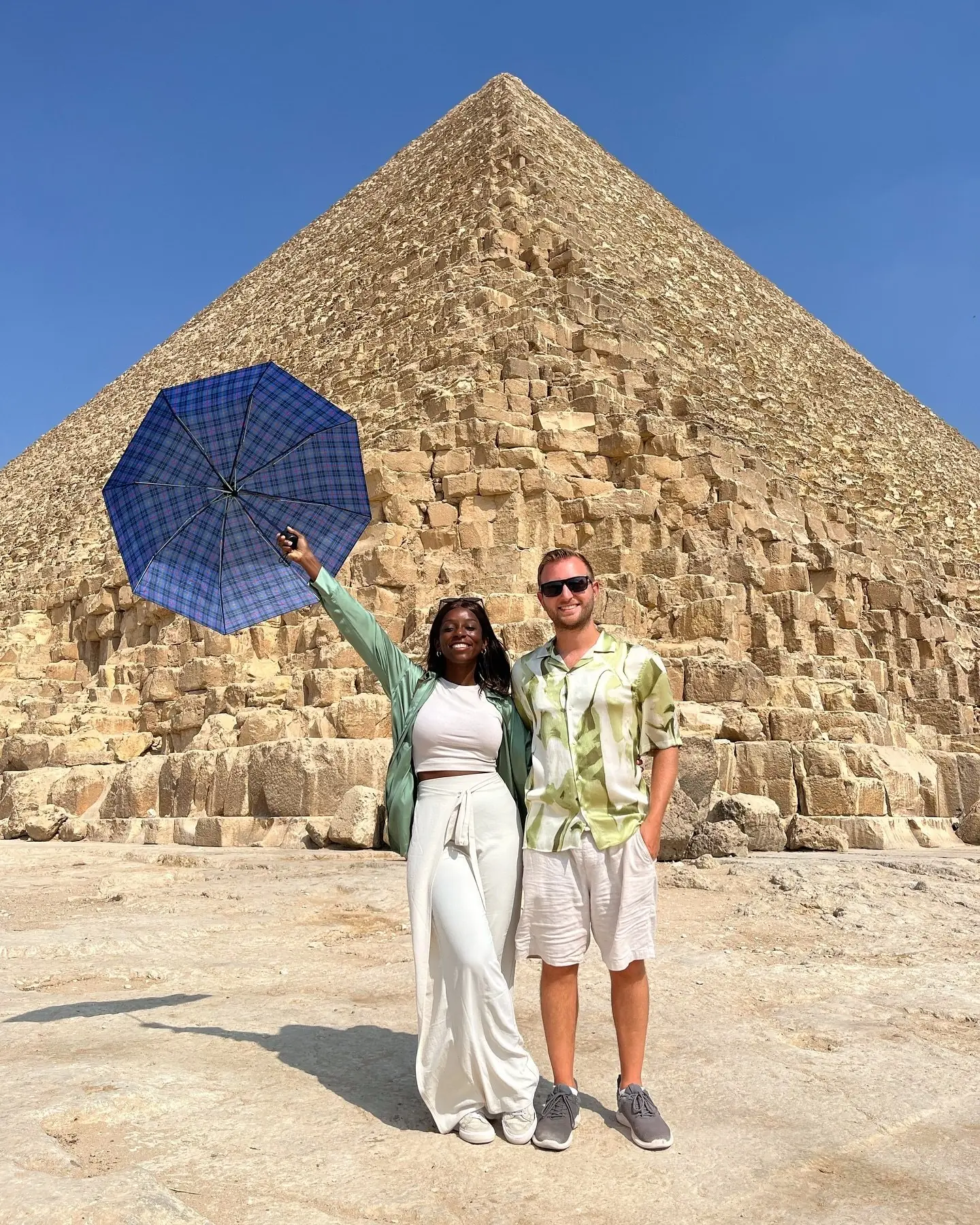 Couple at the base of the Great Pyramid of Giza