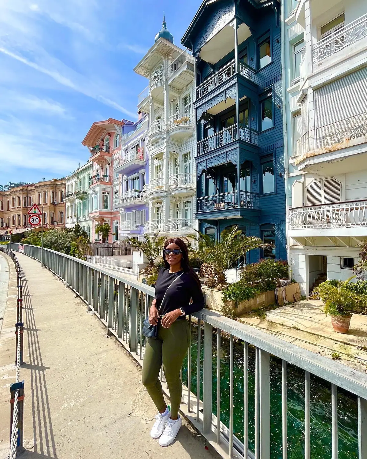 Melody on a waterfront lined with colourful wooden Ottoman houses in Arnavutköy