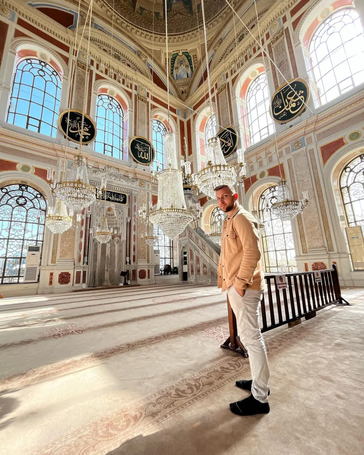 Andrew inside the ornate chandelier-lit Ortaköy Mosque