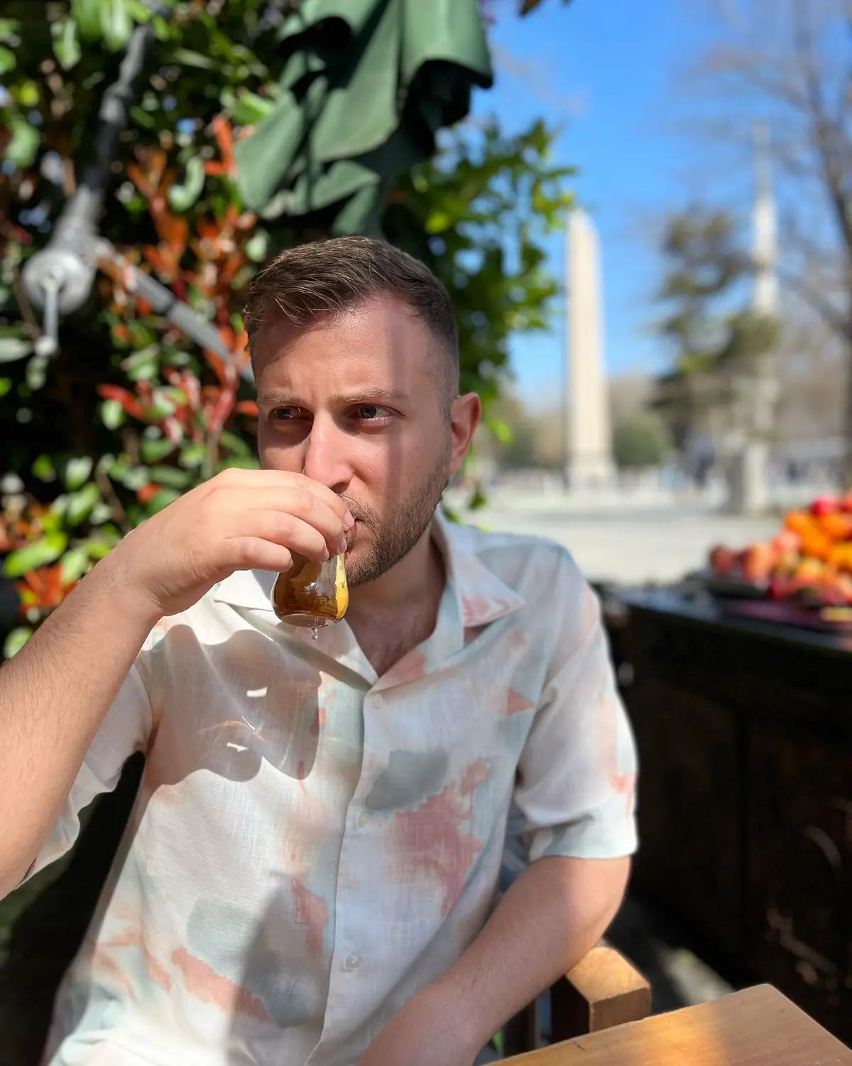 Andrew with a tulip glass of Turkish tea