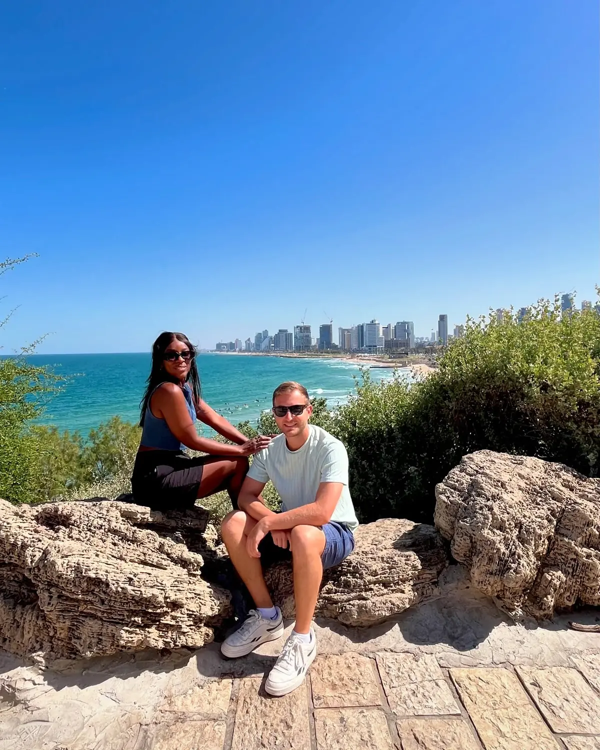 Us on the rocks at Old Jaffa with the Tel Aviv skyline behind