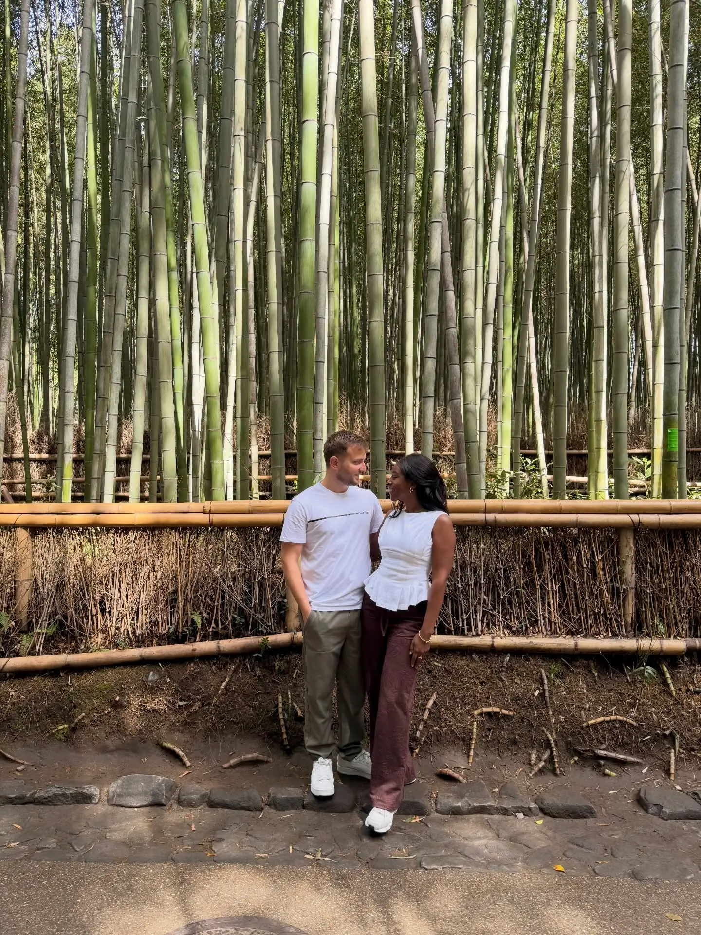 Us in the towering Arashiyama Bamboo Grove