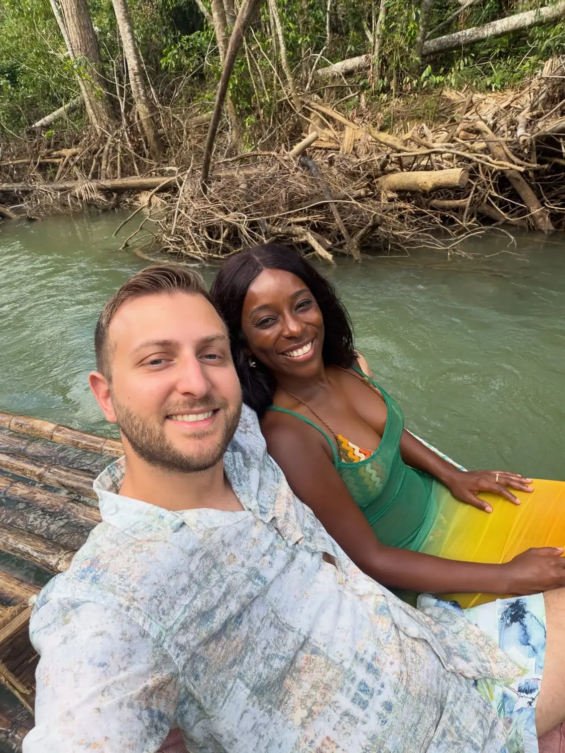 Us relaxing on a bamboo raft floating down the Martha Brae River