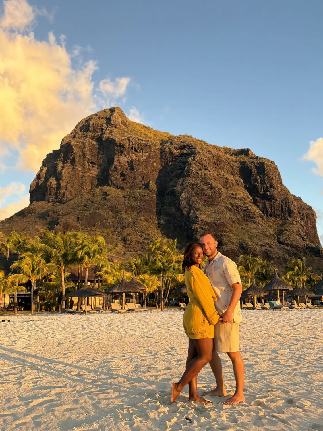 Us on the beach at golden hour beneath Le Morne Brabant, Mauritius
