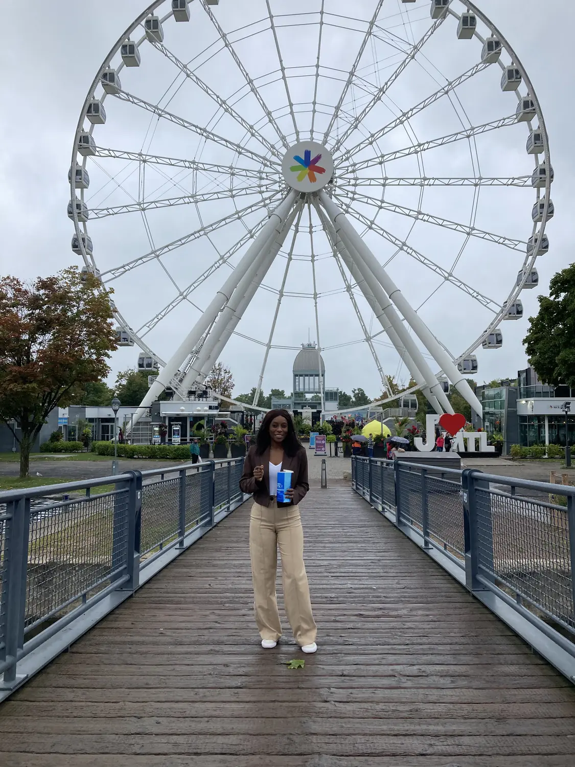 Melody on the Old Port boardwalk with La Grande Roue big wheel behind, Montreal