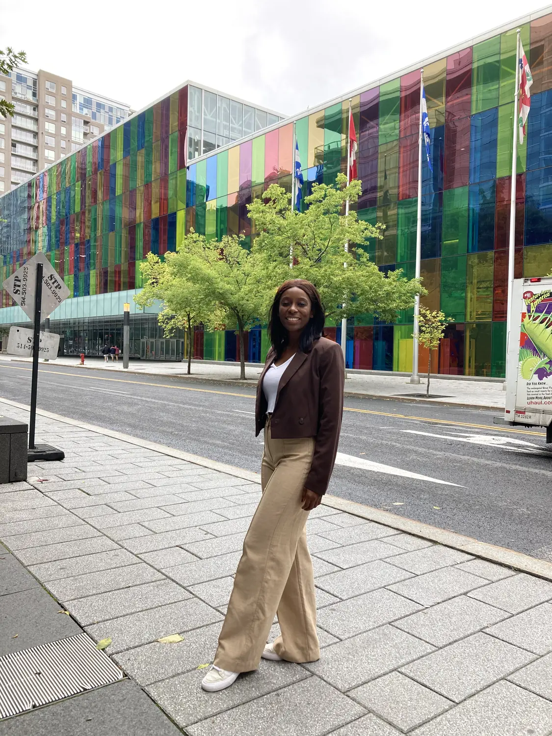 Melody by the colourful rainbow glass of the Palais des congrès in Montreal