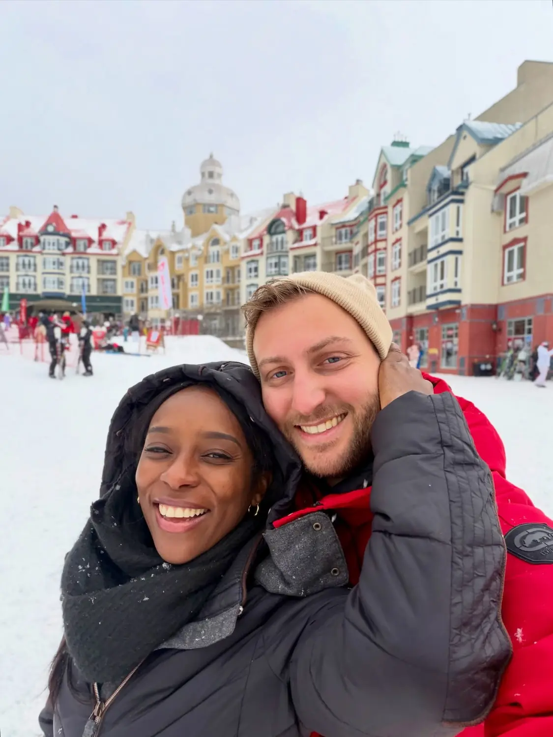 Selfie of us in the colourful pedestrian village of Mont Tremblant in the snow