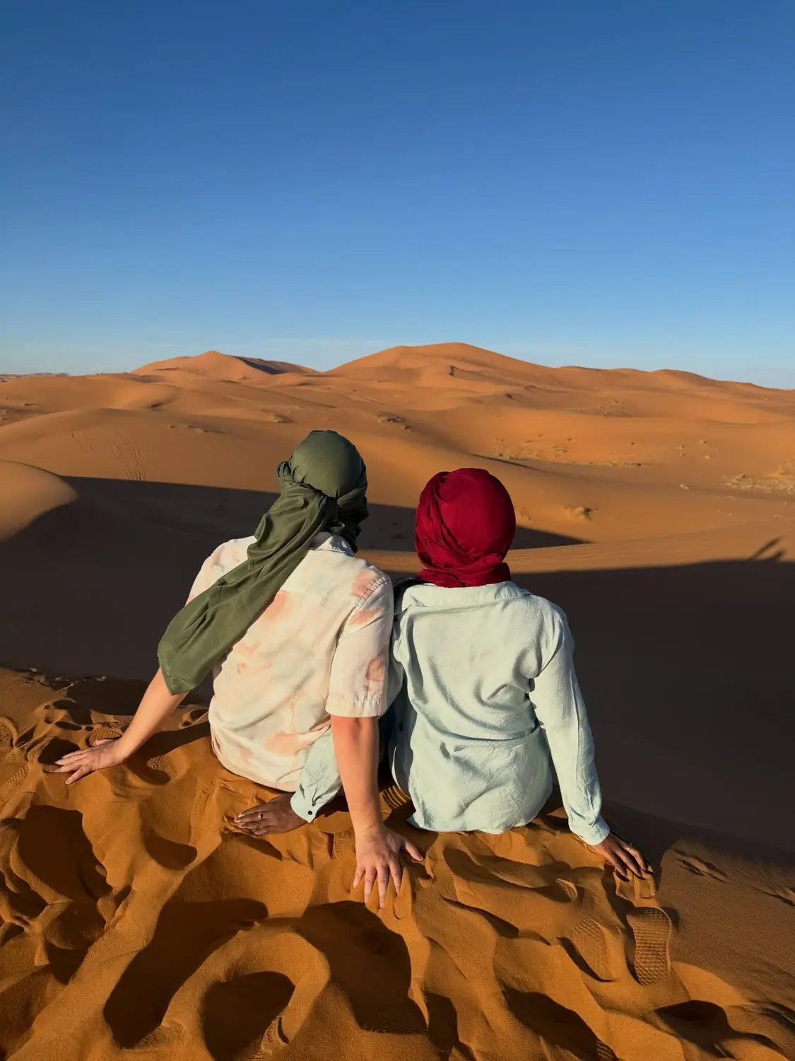 Couple on a Sahara dune