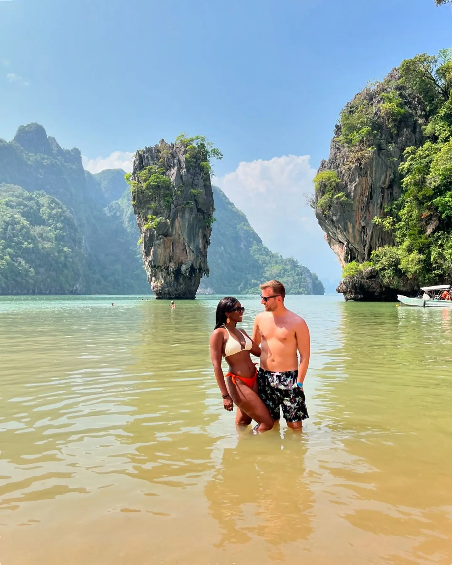 Us in the water in front of James Bond Island in Phang Nga Bay