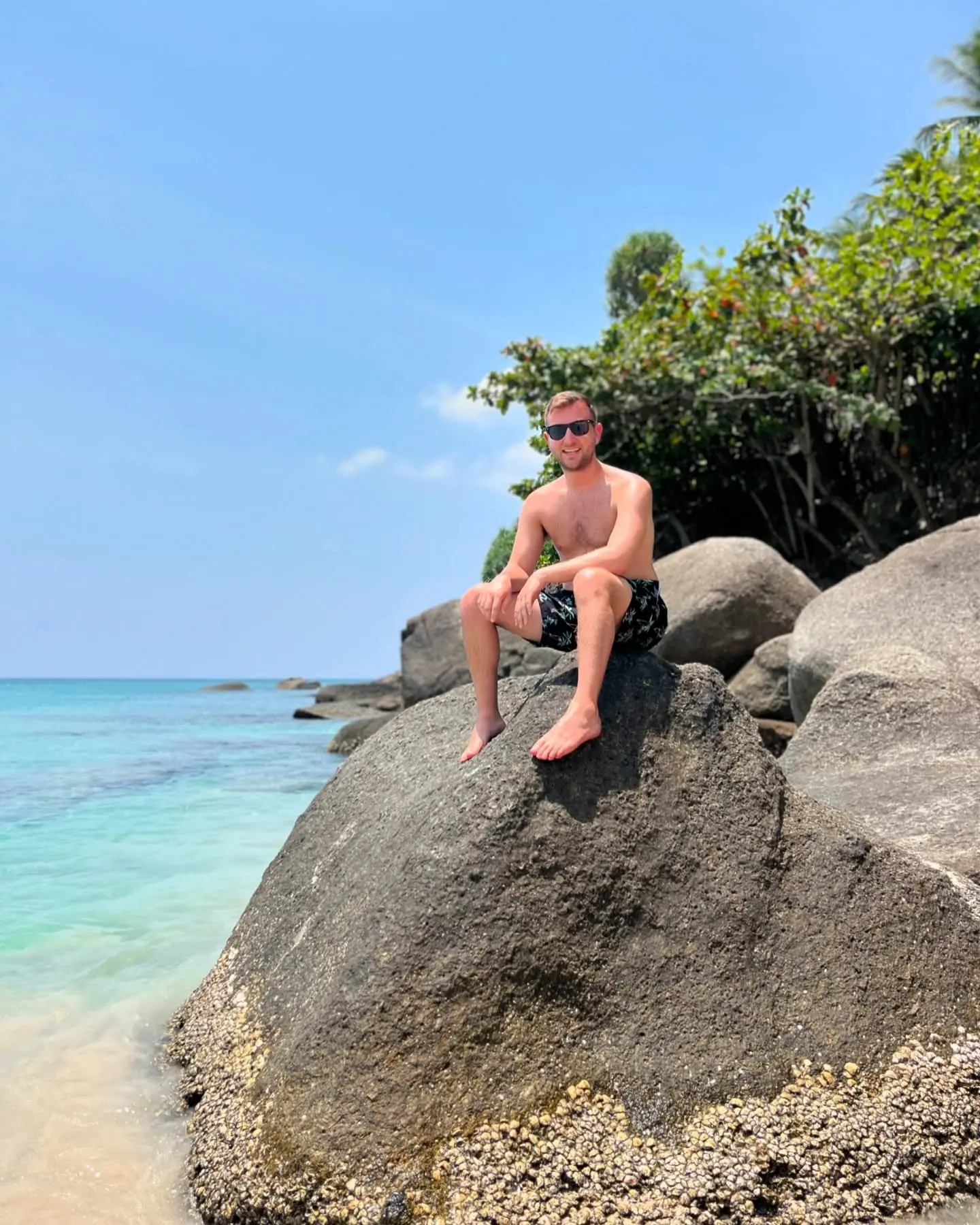On the rocks by the sea