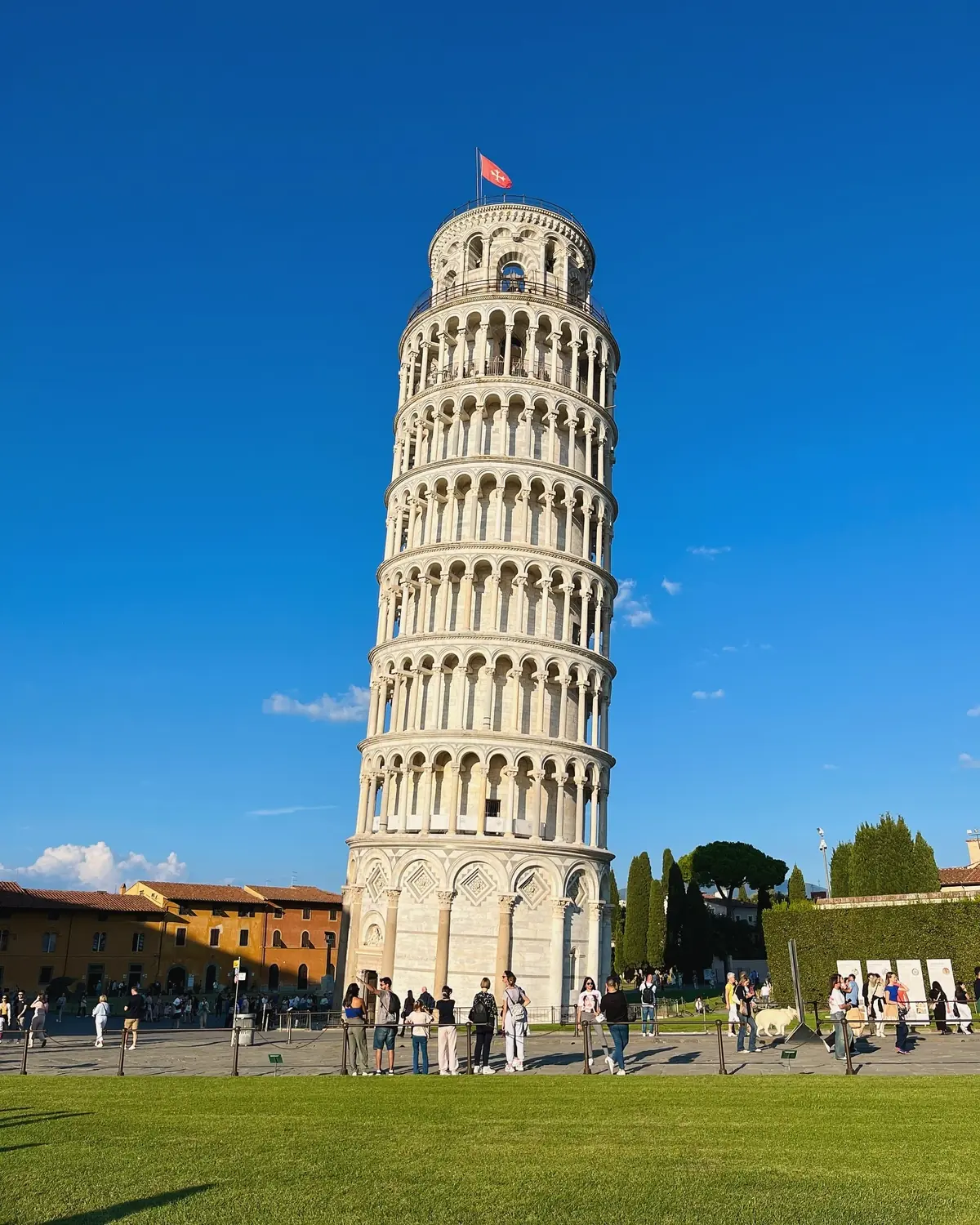 The Leaning Tower of Pisa against a blue sky