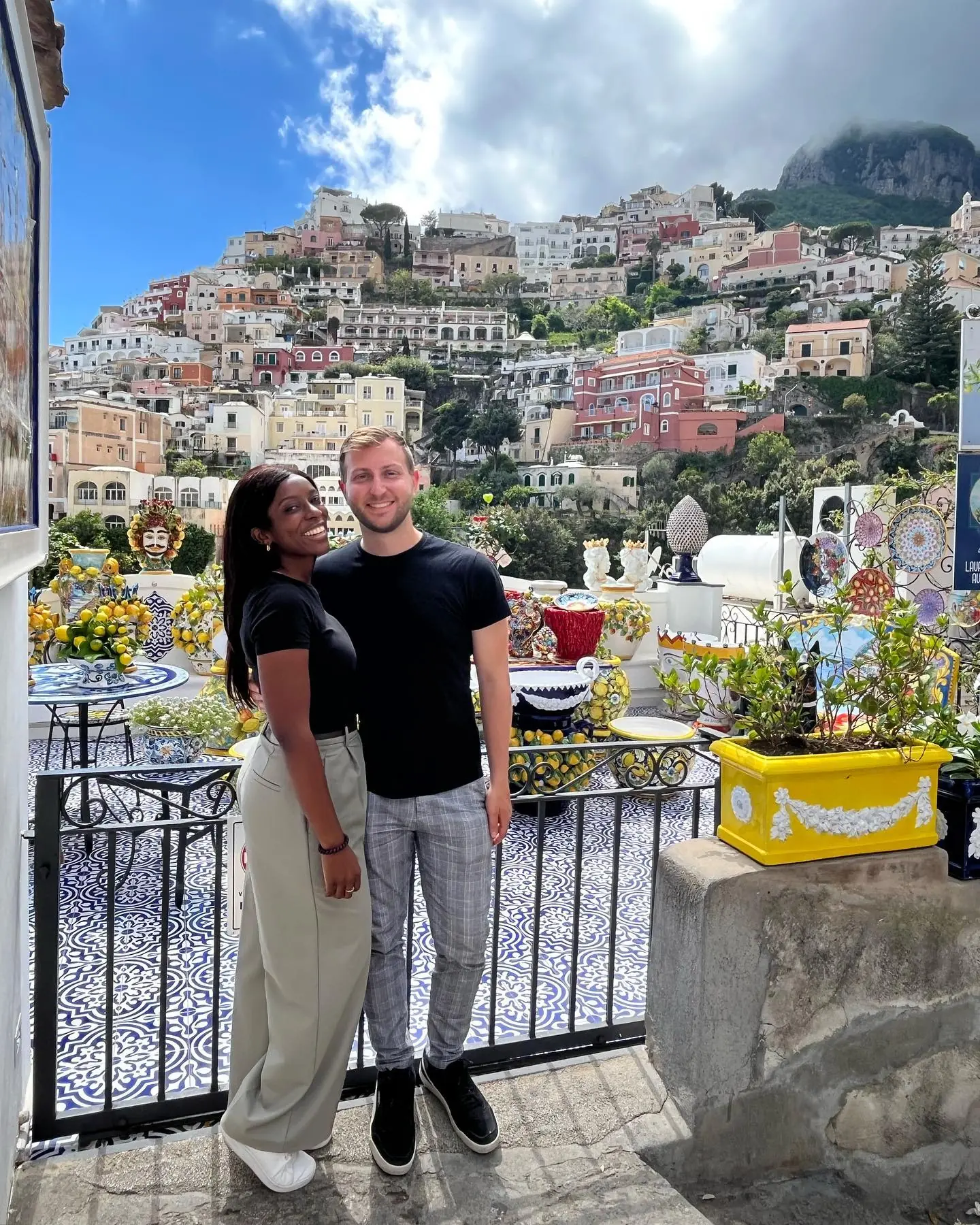 A terrace stacked with lemon-painted Positano ceramics