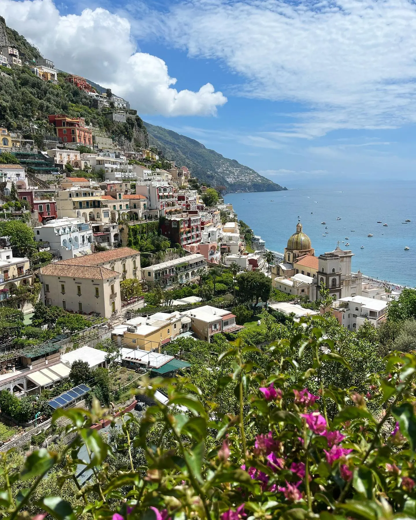 The pastel town of Positano tumbling down to the sea