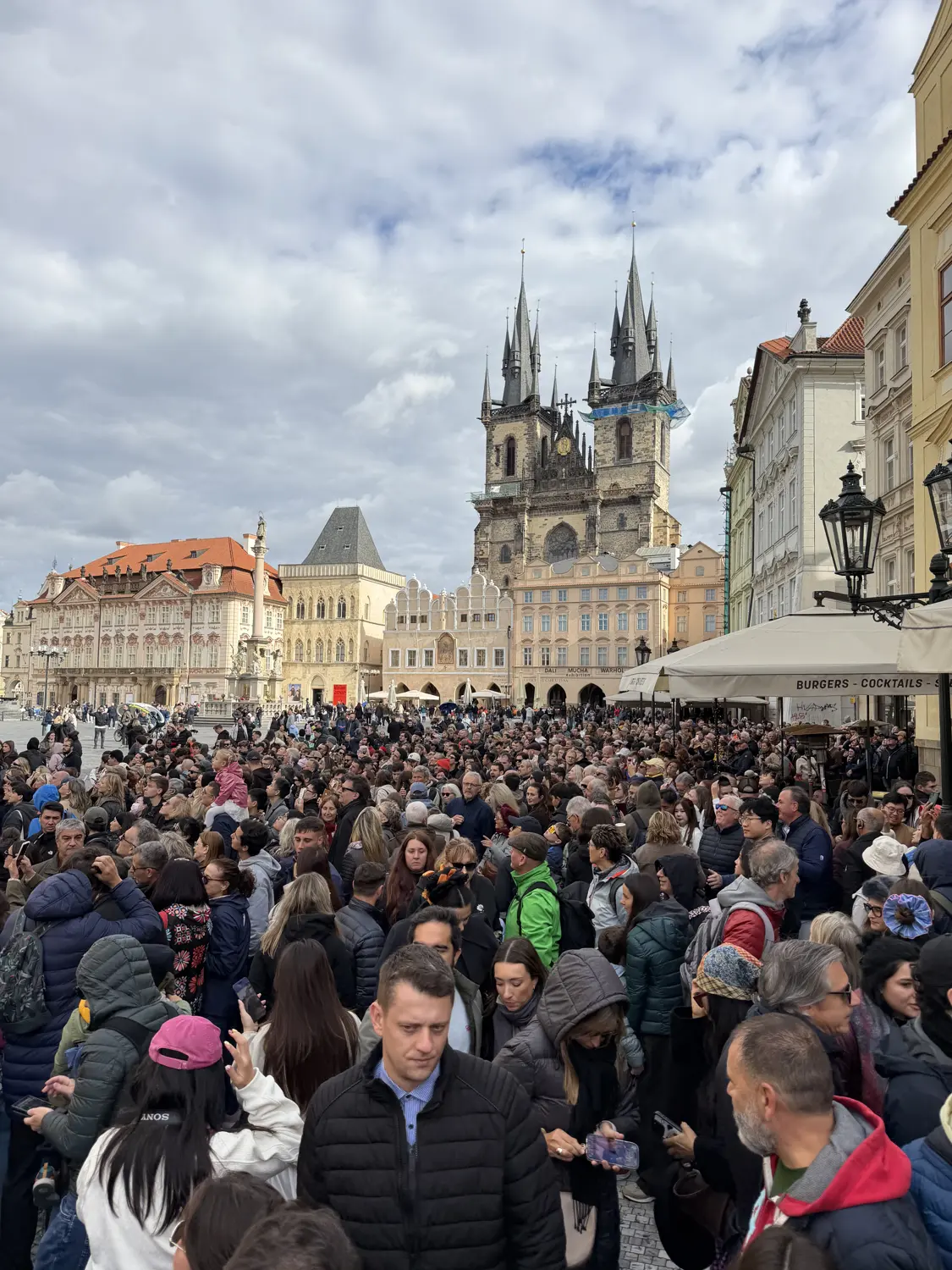 Old Town Square by day with the twin towers of the Týn Church