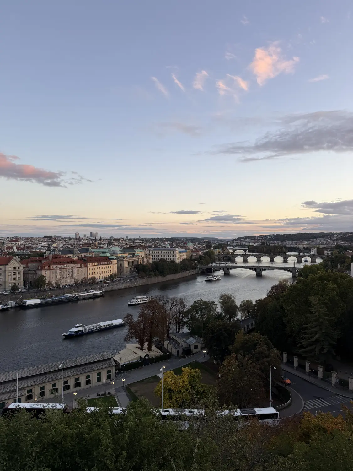 Sunset over the Vltava River and its bridges seen from above