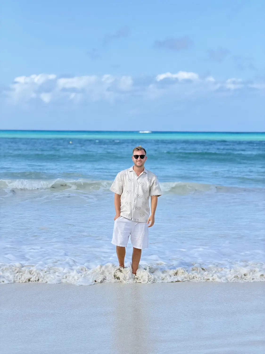 Andrew in the waves on Praslin
