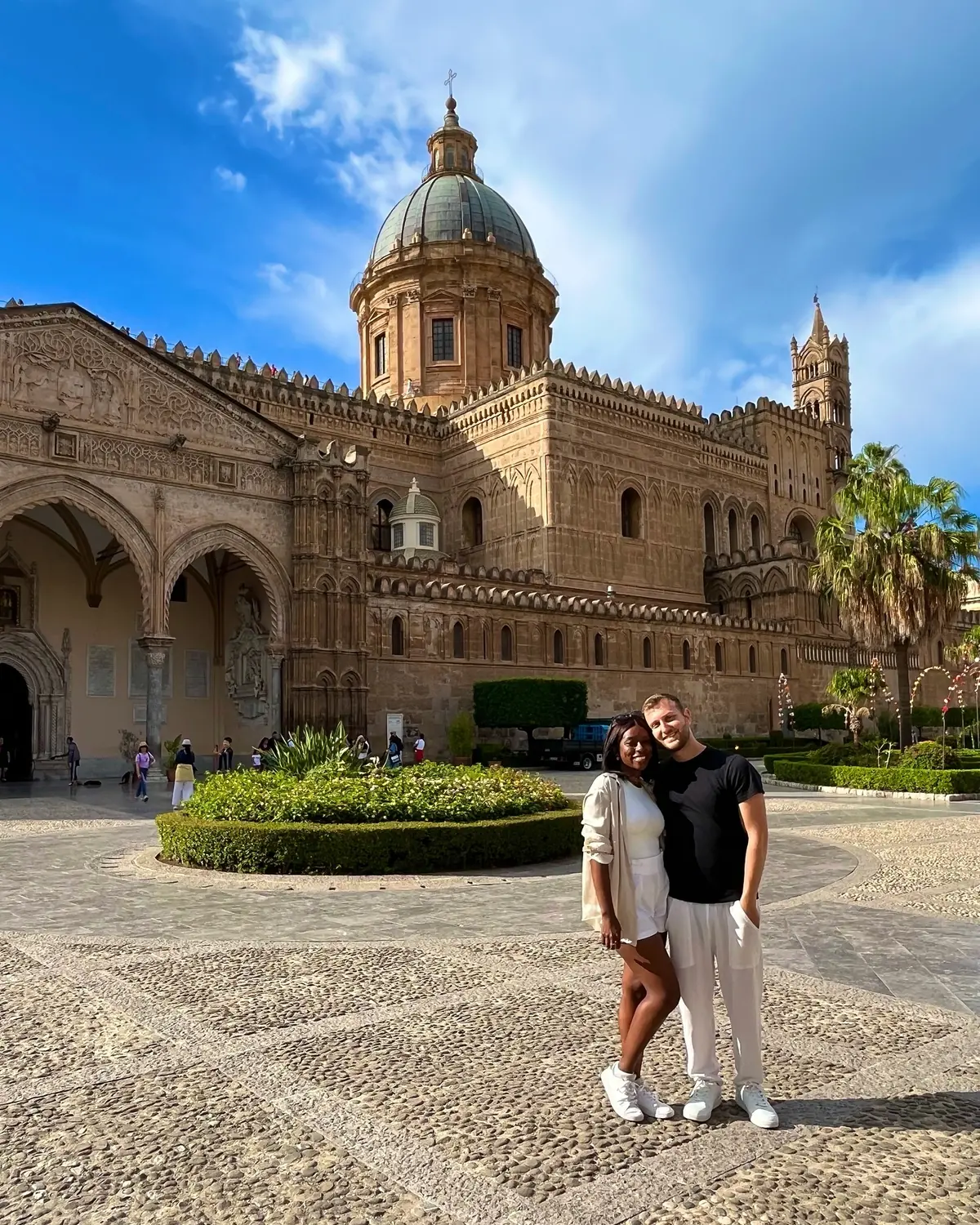 Us in front of the dome of Palermo Cathedral in Sicily