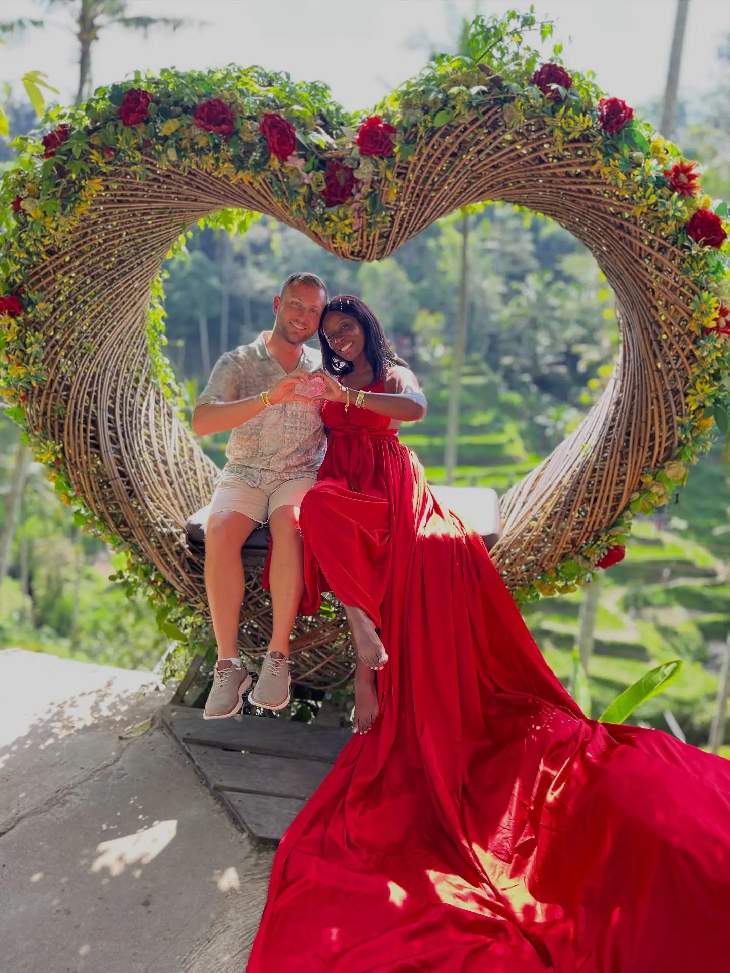 Andrew and Melody at a heart photo spot in Ubud