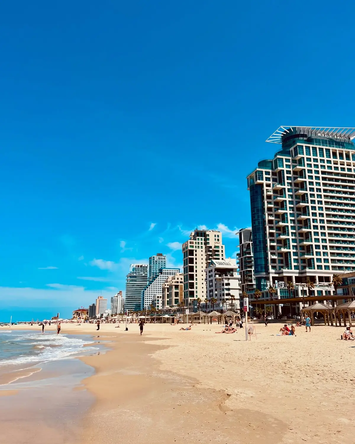 Tel Aviv's beachfront and skyline on a bright day