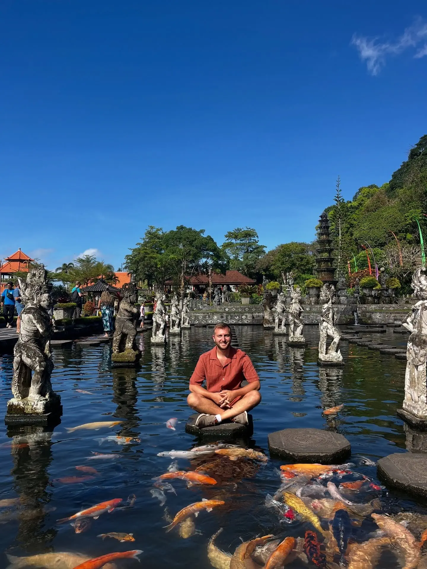 Stepping stones across the koi pond at Tirta Gangga