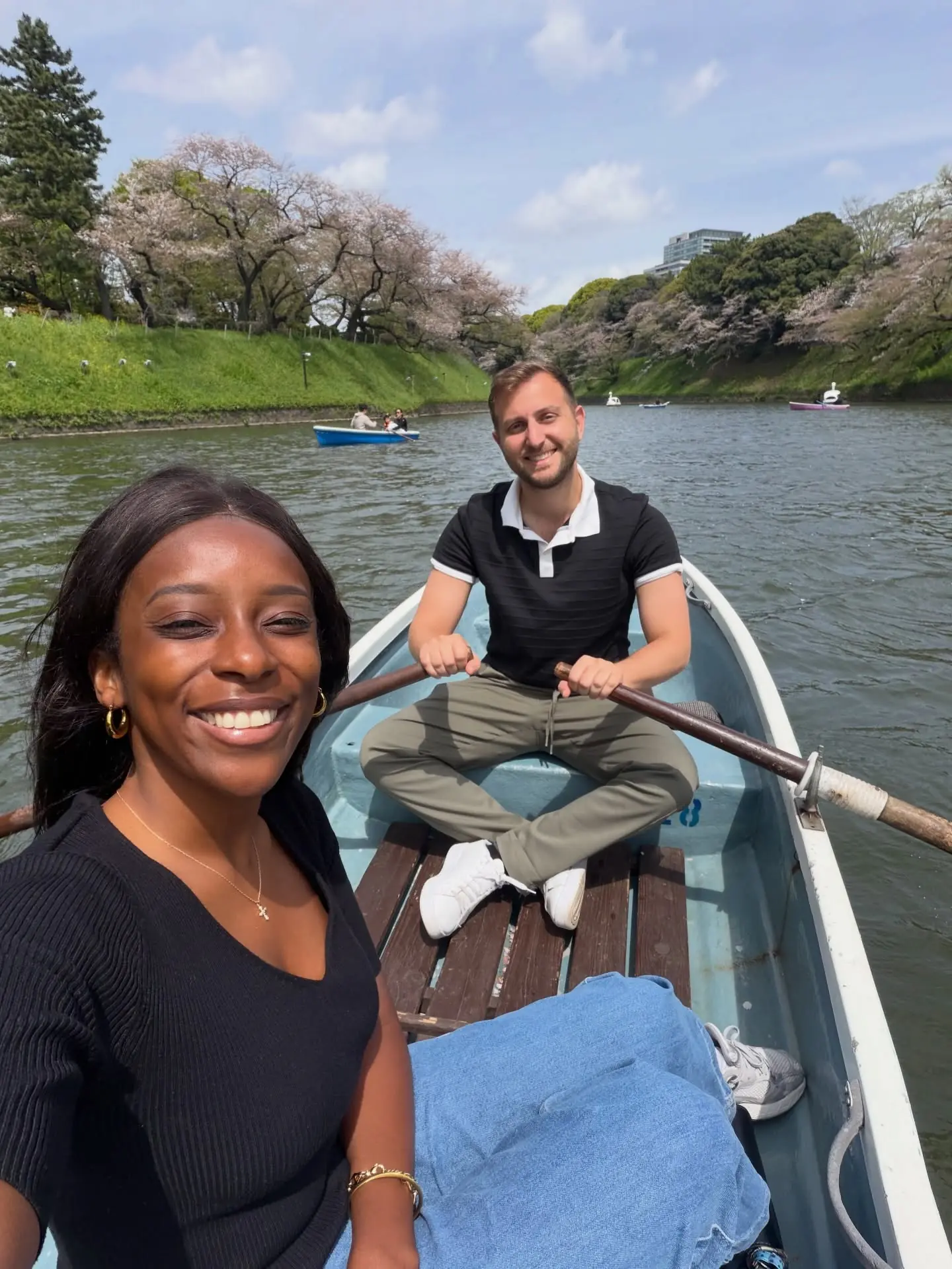 A selfie rowing a boat under cherry blossoms at Chidorigafuchi