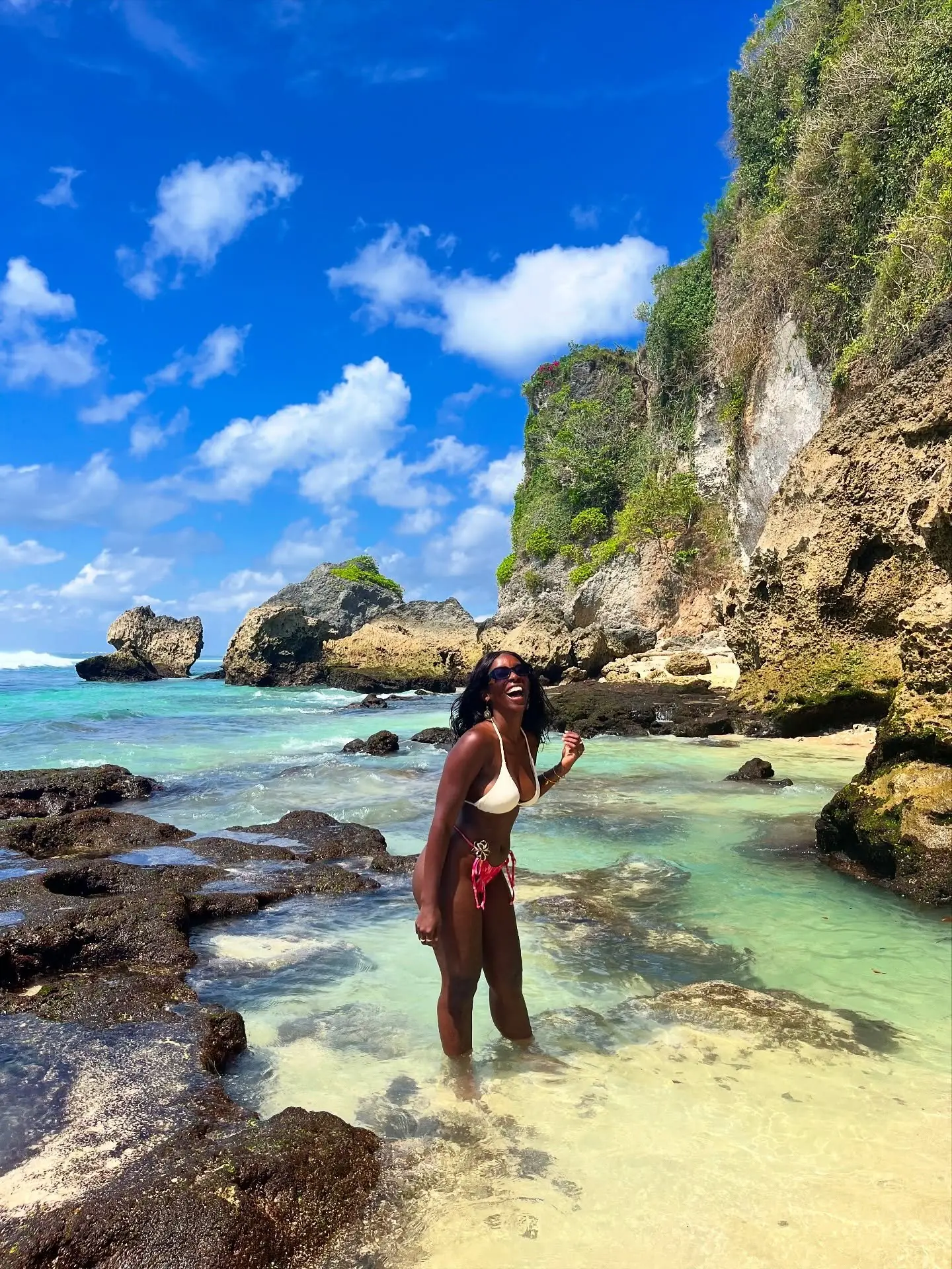 Turquoise tide pools below the Uluwatu cliffs