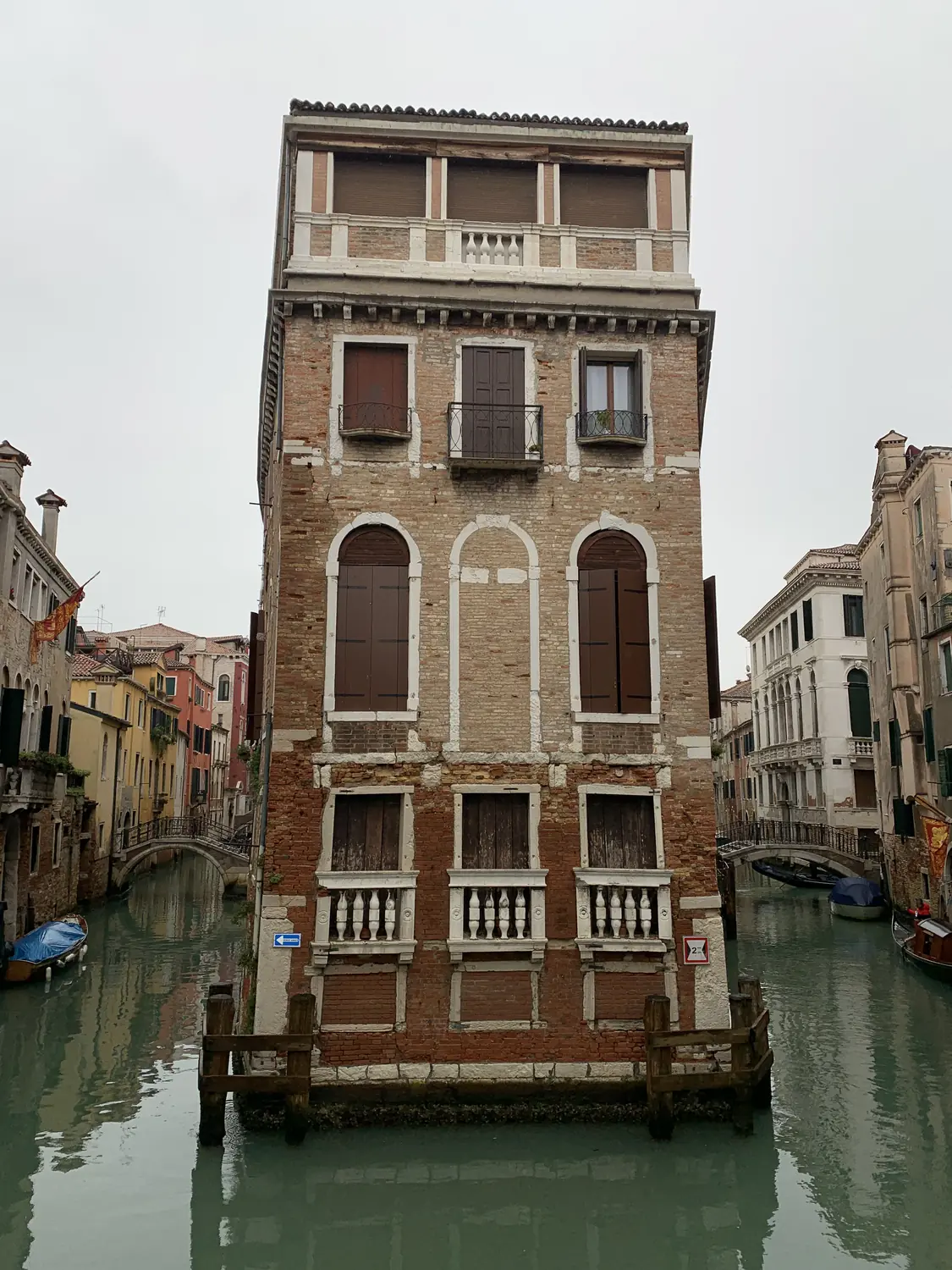 An old Venetian palazzo rising straight out of a canal