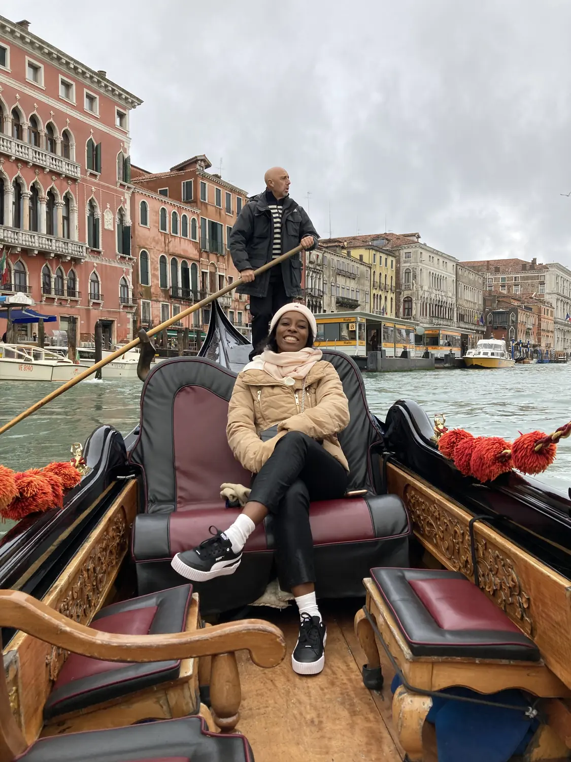 Us on a gondola ride gliding through a Venice canal