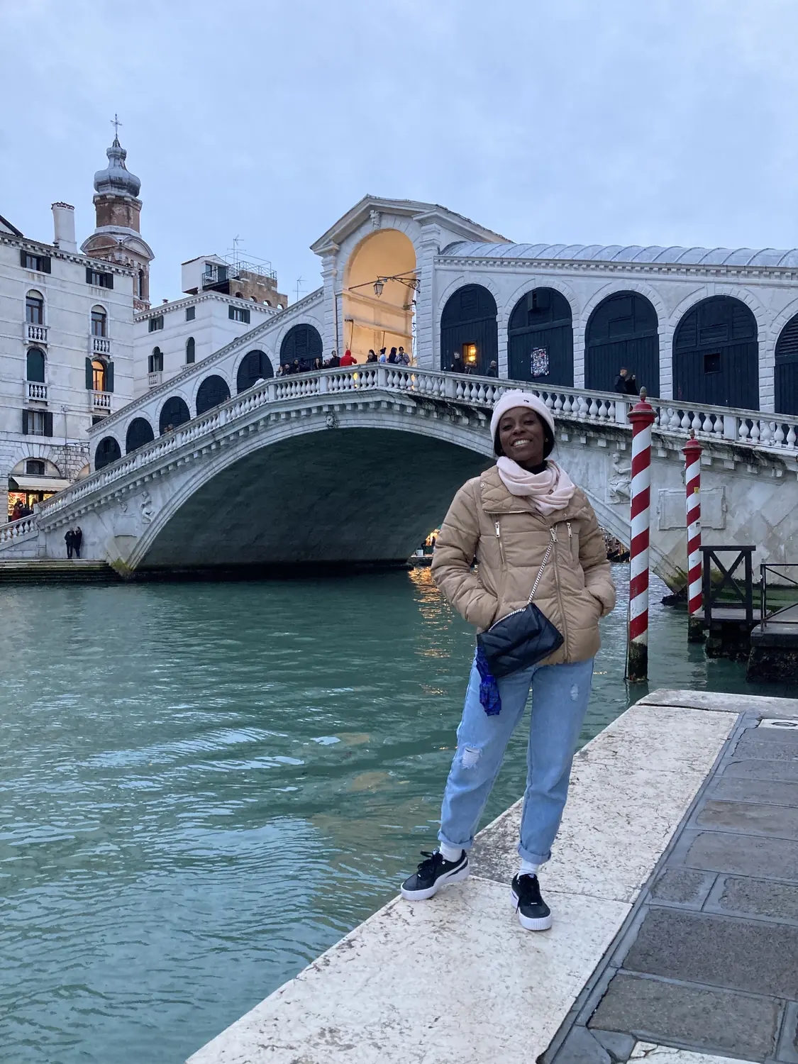 Melody in front of the Rialto Bridge over the Grand Canal in Venice